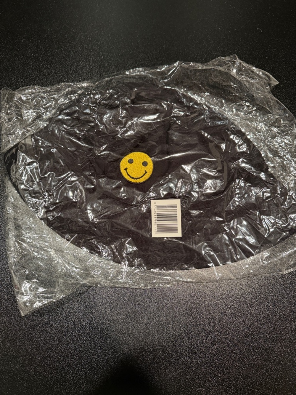 Black Bucket Hat with Yellow Smiley Patch